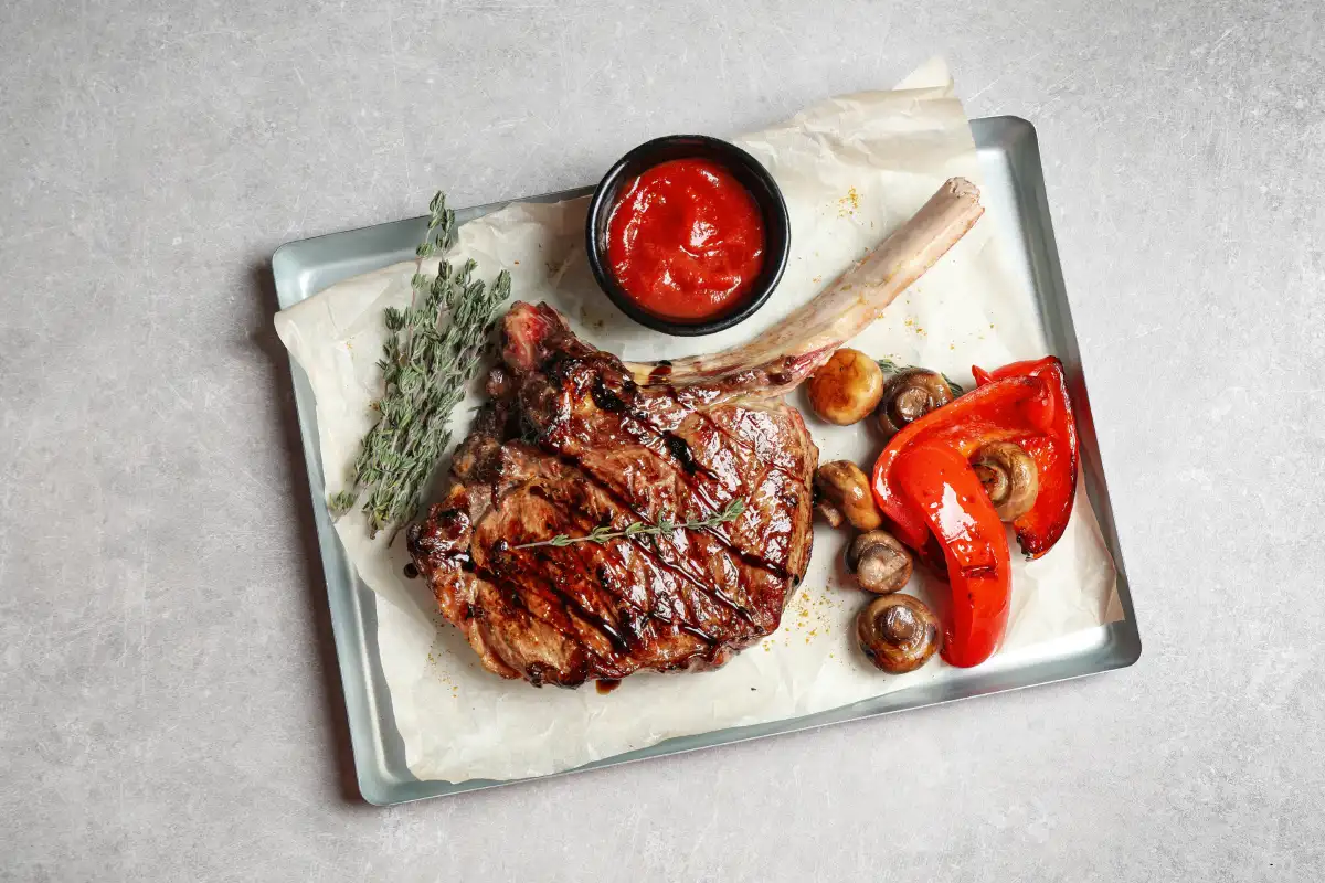 Côte de bœuf : cuisson parfaite au four ou barbecue en 5 règles d’or